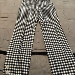 Navy and white ( dark enough to be black) checked cropped pants . Side zip .